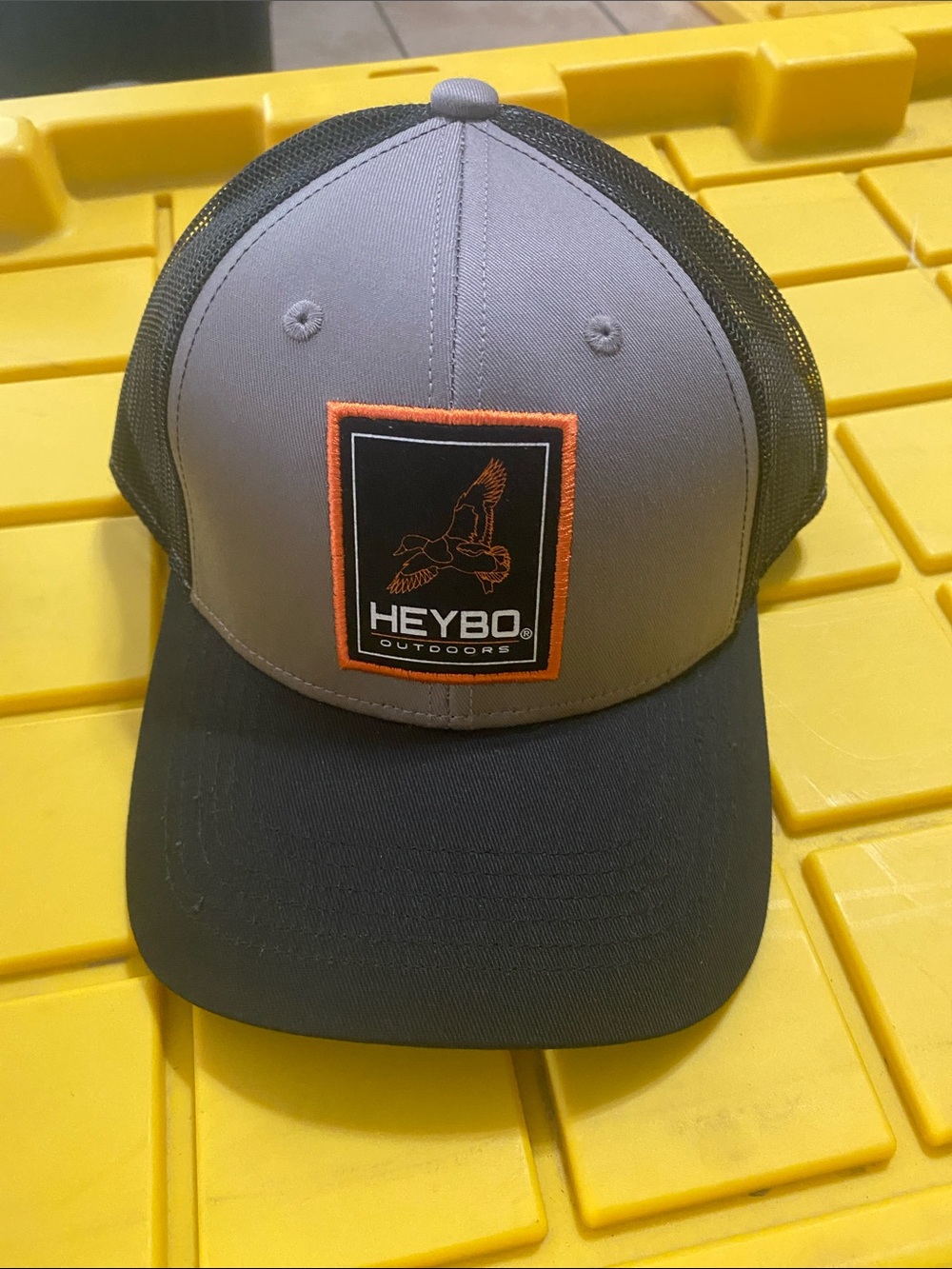 Heybo Outdoors Men's Gray & Black Trucker Hat with Orange Trim